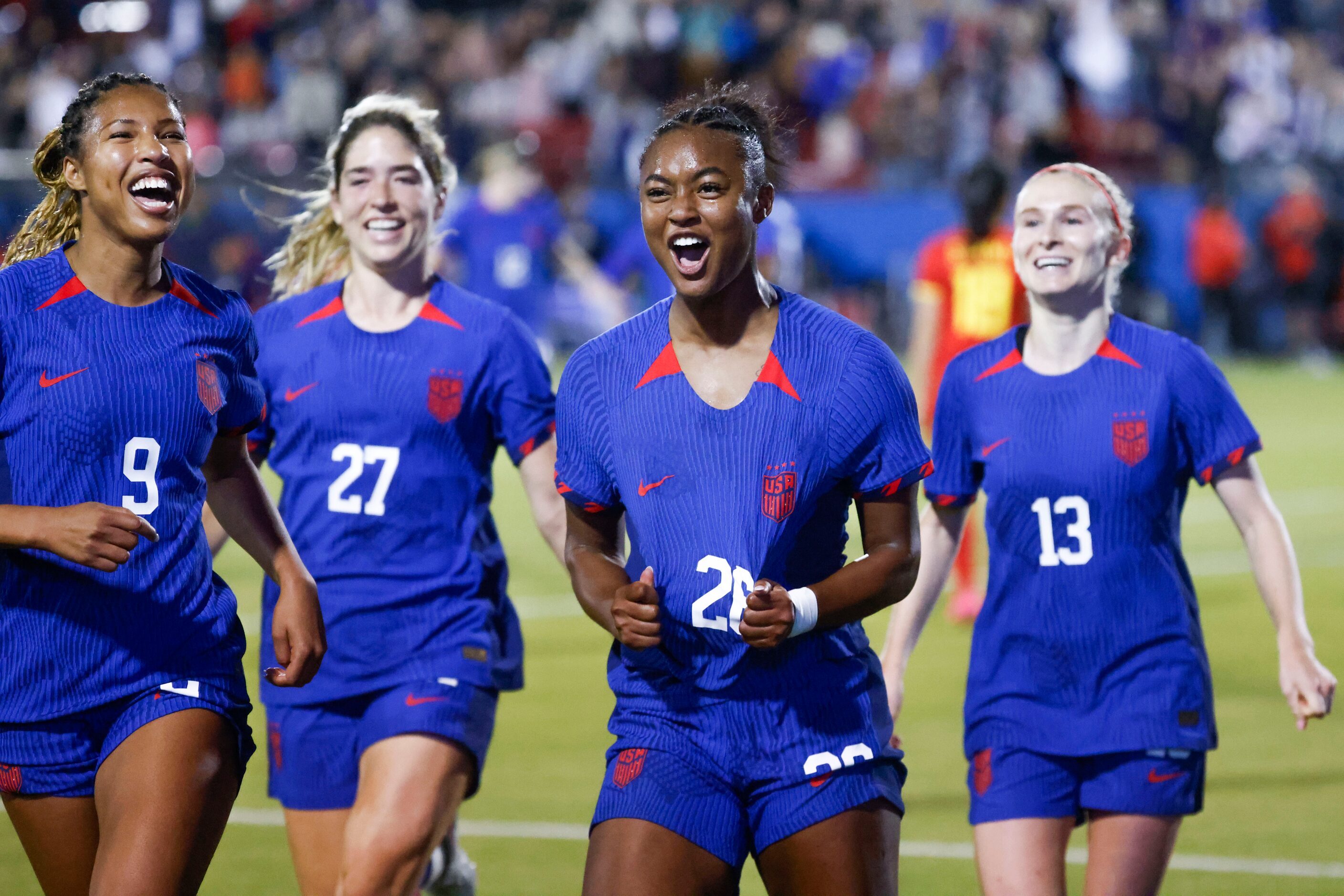 Untied State’s Jaedyn Shaw (center right) celebrates her first international goal during the...