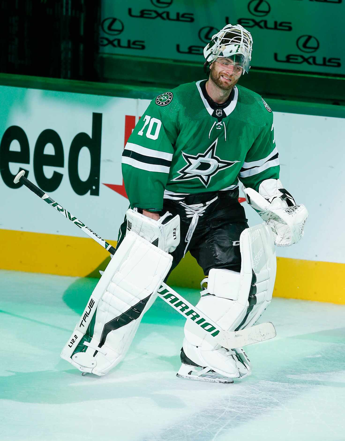 Dallas Stars goaltender Braden Holtby (70) acknowledges fans after being named the second...