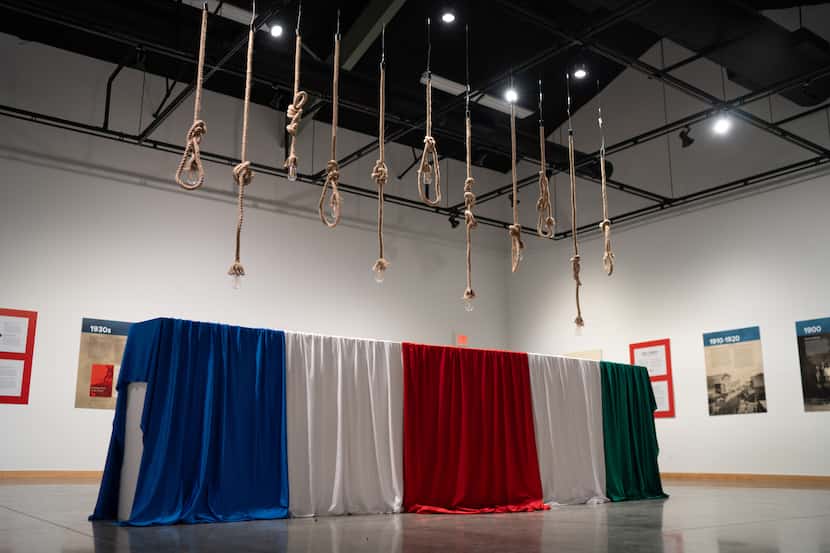 An art installation sits at the center of the "Life and Death on the Border" gallery at the...