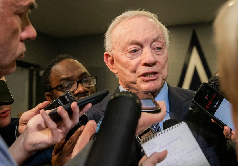 FILE - Cowboys owner Jerry Jones speaks with members of the media following a game between...