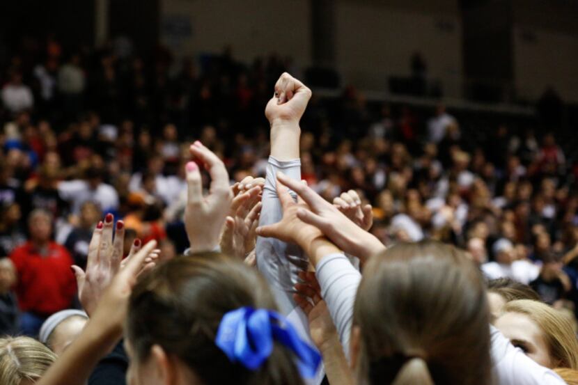 Coppell celebrates their Class 5A semi-finals win over Houston Clear Lake at the Curtis...