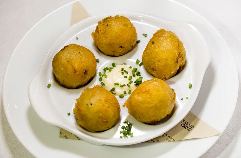 Crab beignets with garlic-lemon aioli at Parigi on Wednesday, Feb. 8, 2017, in Dallas....