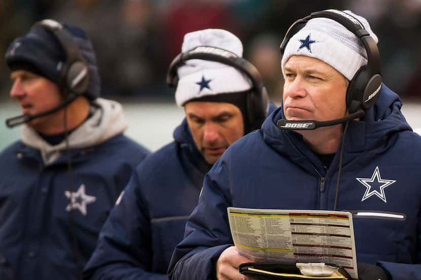 Dallas Cowboys offensive coordinator Scott Linehan works on the sidelines during the second...