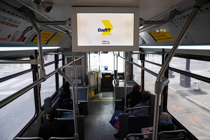 Riders on DART bus route 16 in downtown Dallas. The transit agency has plans in place as...
