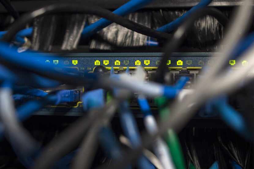 Network cables are seen going into a server in an office building in Washington, DC on May...
