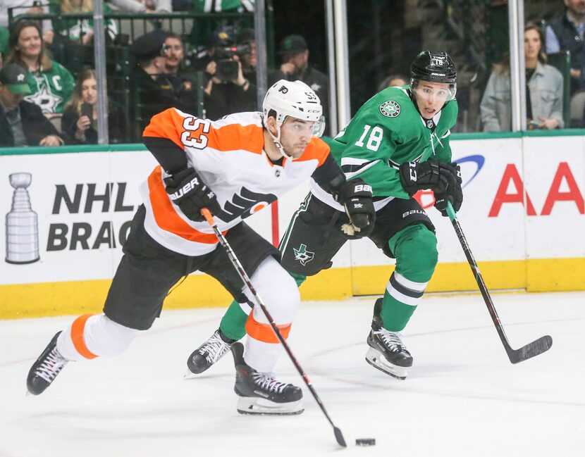 Philadelphia Flyers defenseman Shayne Gostisbehere (53) looks to pass against Dallas Stars...