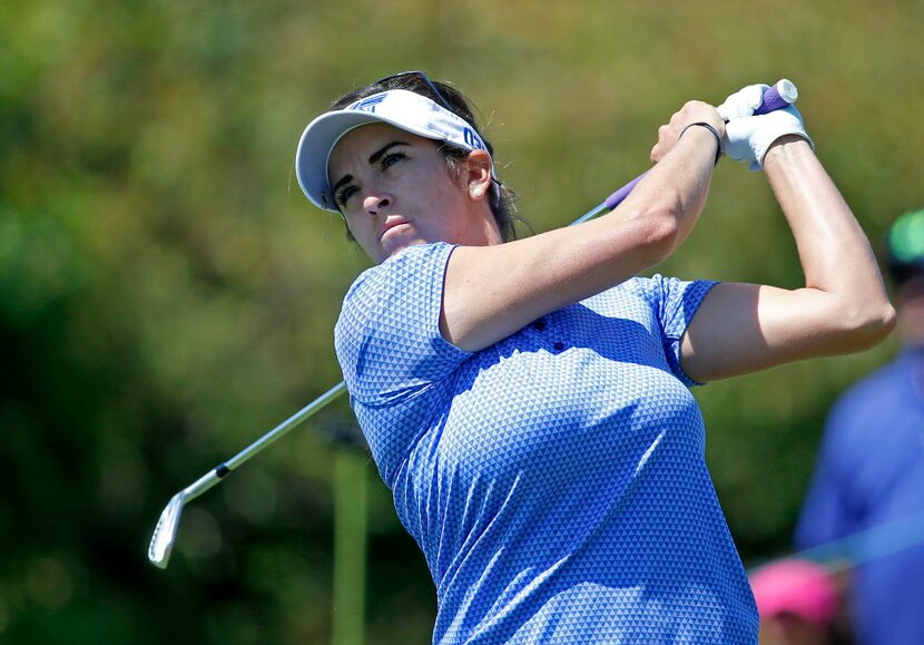 Gerina Piller watches her tee shot on the 11th hole tee box during the final round of the...