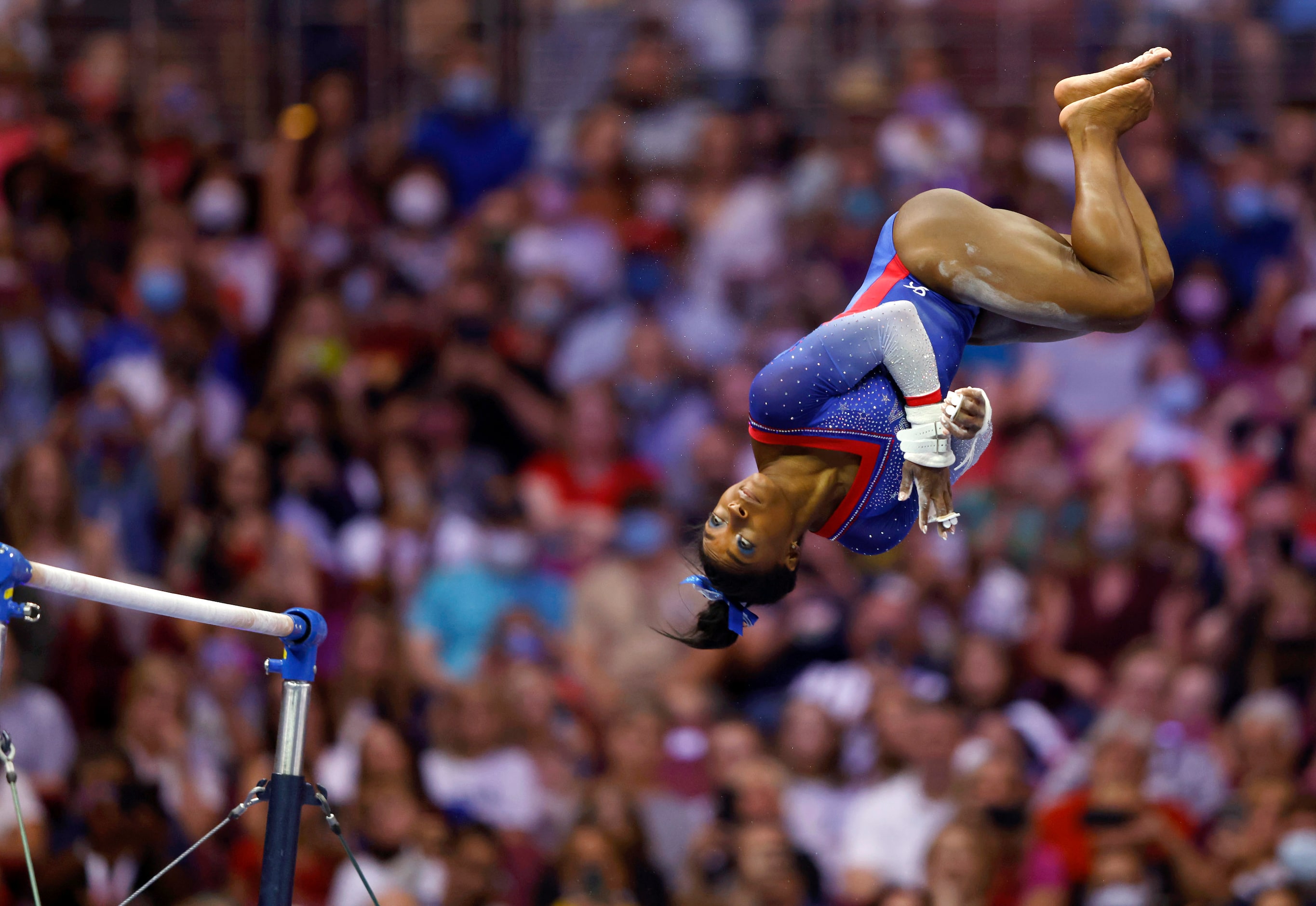 Simone Biles of World Champions competes in the uneven bars during day 1 of the women's 2021...