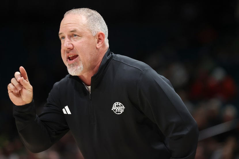 Texas A&M head coach Buzz Williams talks to a player during the first half of an NCAA...