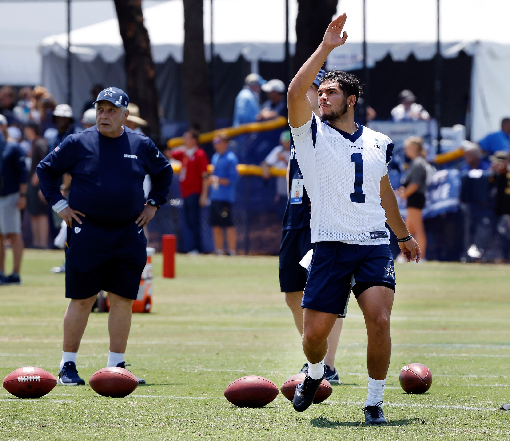 Dallas Cowboys kicker Jonathan Garibay (1) follows through on a kick during the second...