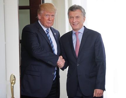 President Donald Trump shakes hands with Argentine President Mauricio Macri outside the West...