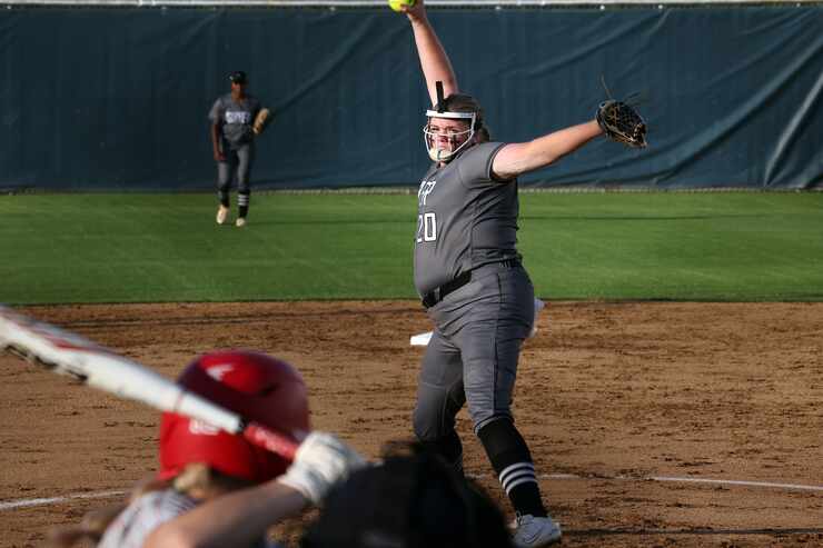 Denton Guyer pitcher Finley Montgomery (20) delivers a pitch to a Flower Mound Marcus batter...