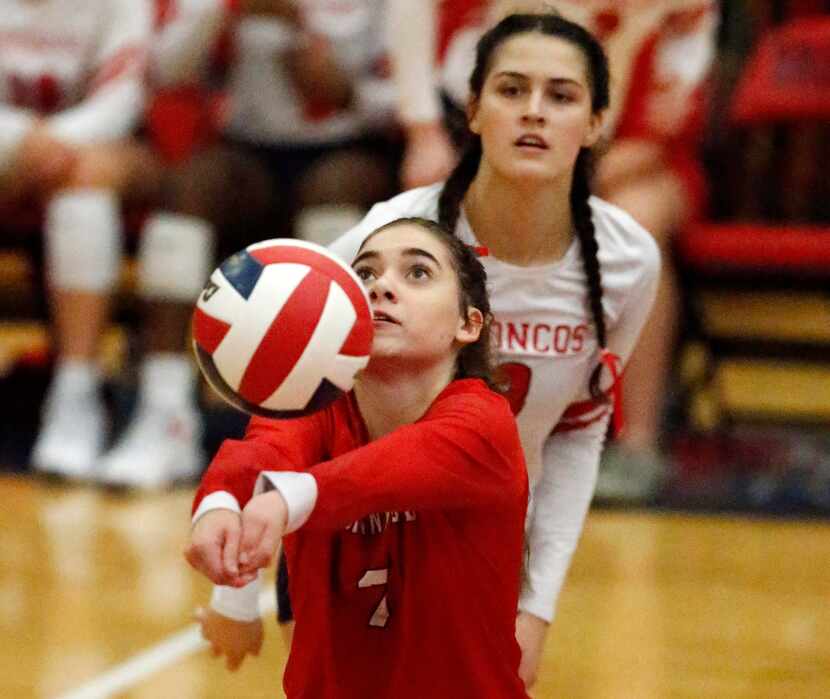McKinney Boyd High School defensive specialist Macy Parker (7) makes a pass during game one...
