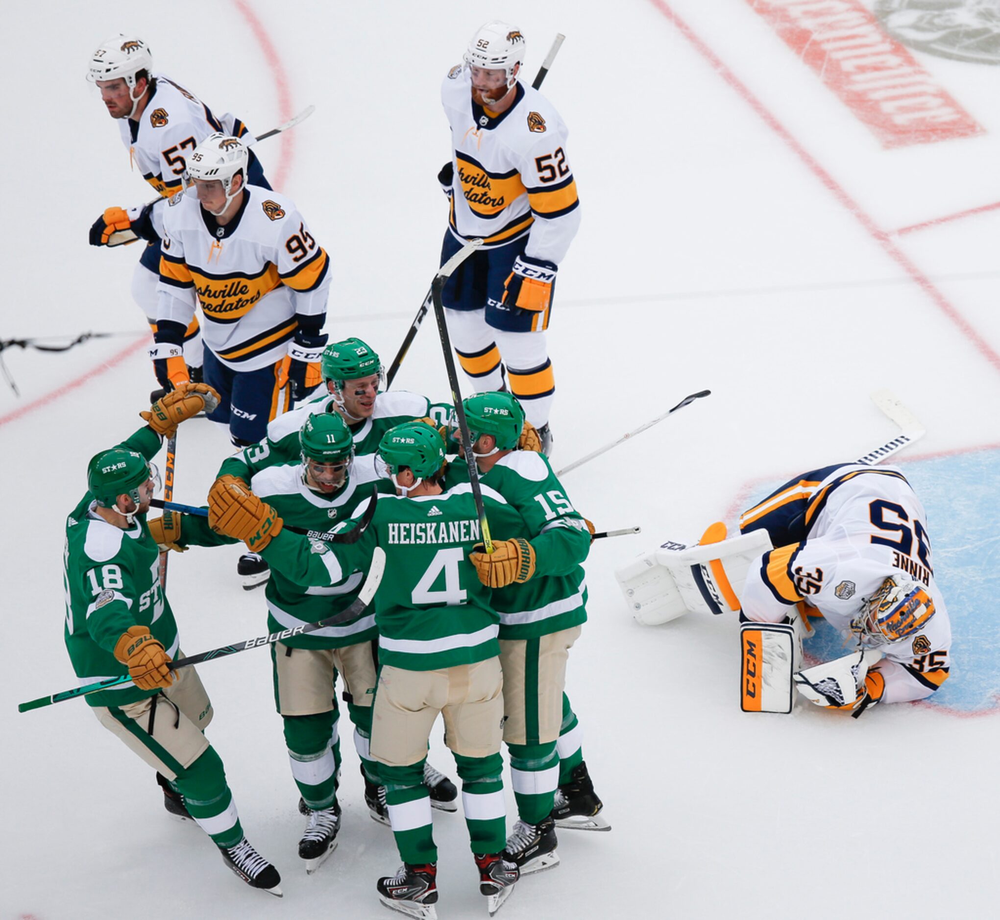 The Dallas Stars celebrate after Dallas Stars left wing Blake Comeau (15) scored a goal on...