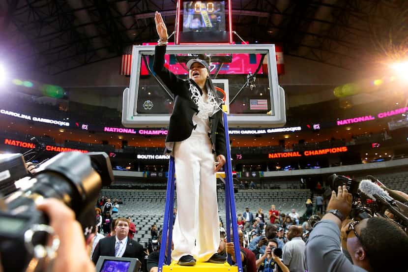 South Carolina Gamecocks head coach Dawn Staley salutes the crowd after cutting down the net...