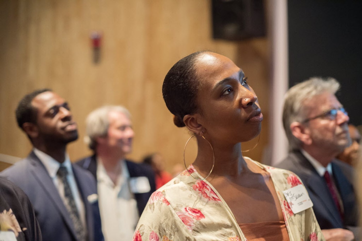 Chris McSwain listens to a speaker during Actions Speak Louder, a forum on race relations...