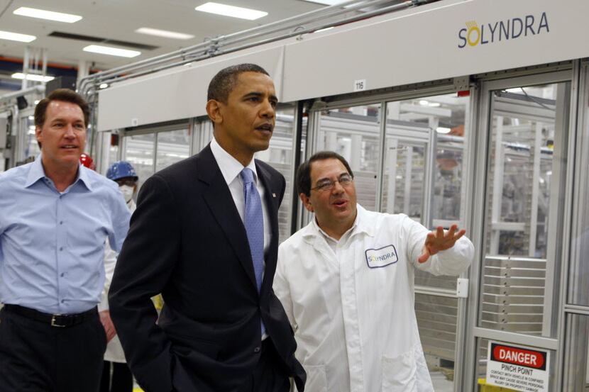 In this May 26, 2010 file photo, President Barack Obama is given a tour of Solyndra by...