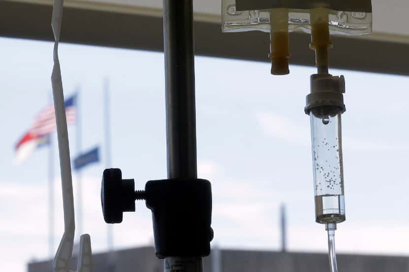 FILE - In this Sept. 5, 2013 file photo, chemotherapy is administered to a cancer patient...