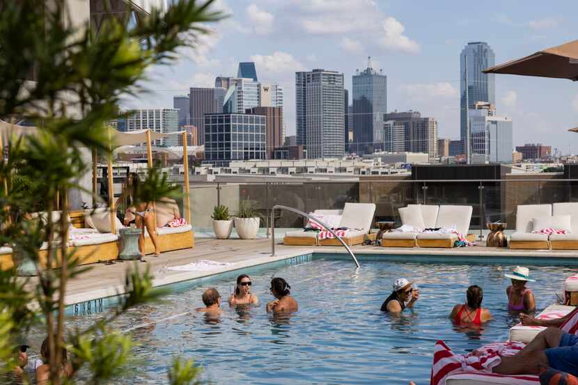 People enjoy the the pool club at the Virgin Hotels Dallas on Friday, Aug. 19, 2022.