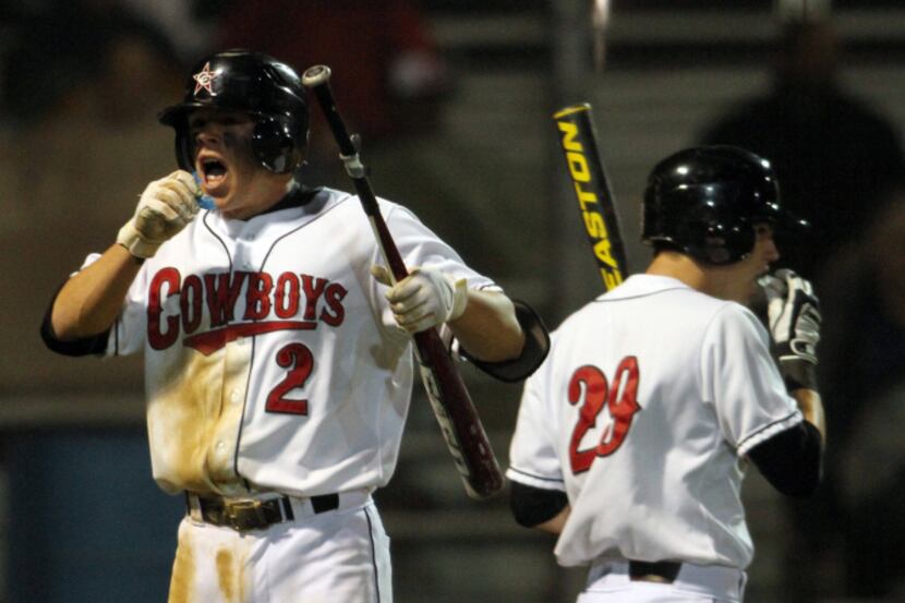 Coppell Cowboys baserunner Tyler Jones (2) catches his breath after scoring from second base...