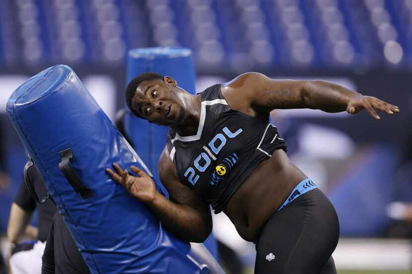 Former Florida State defensive lineman Timmy Jernigan takes part in position drills during...