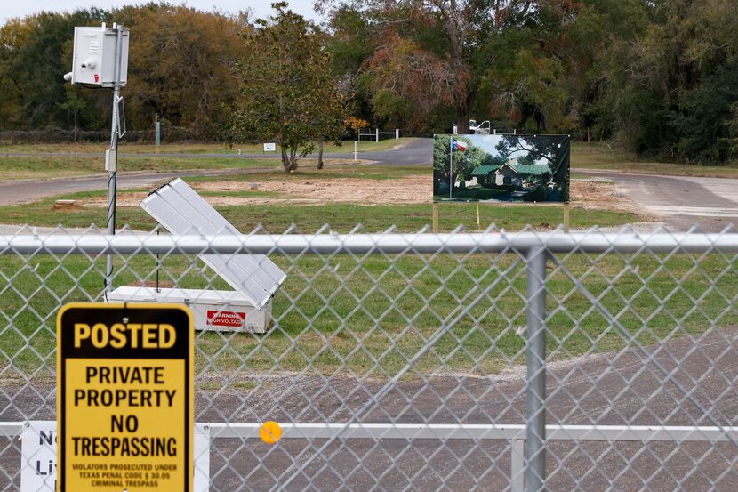 Dirt and grass cover the former site of the Fairfield Lake State Park Headquarters building...