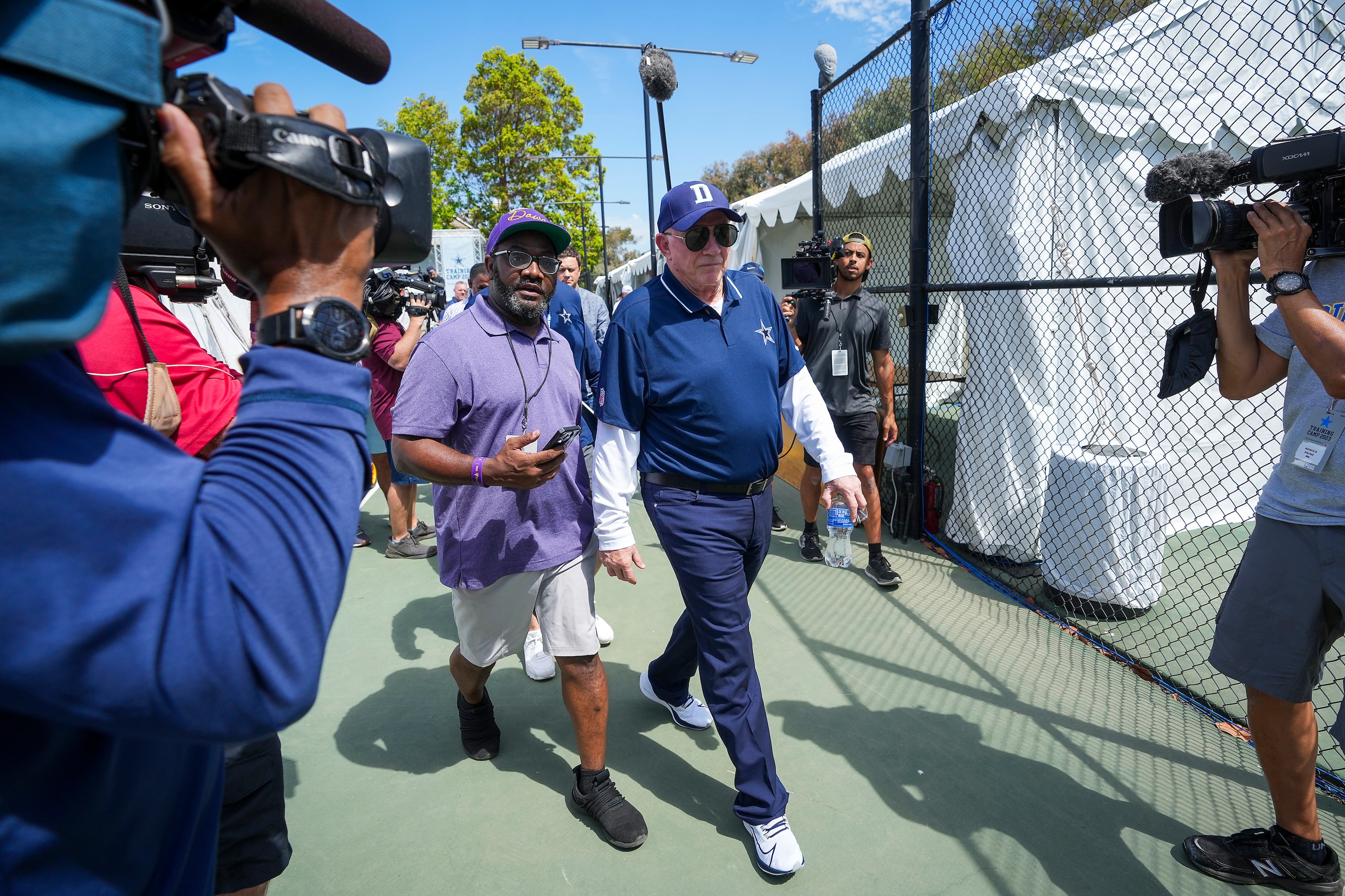 Dallas Cowboys owner and general manager Jerry Jones departs a pre-training camp news...