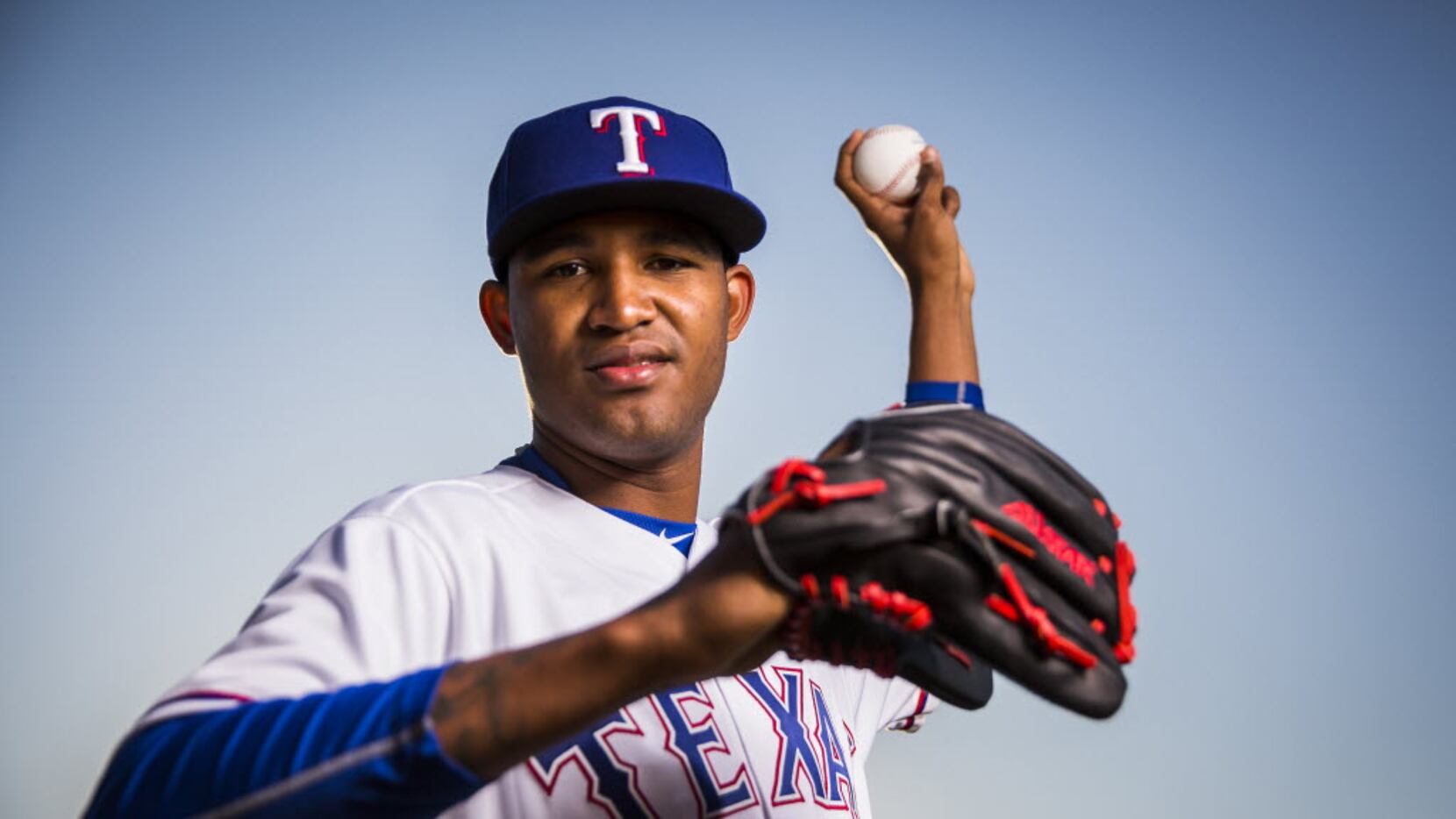 Texas Rangers pitcher Yohander Mendez photographed during spring training photo day at the...