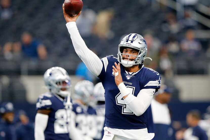 Dallas Cowboys quarterback Dak Prescott (4) throws during pregame warmups before facing the...
