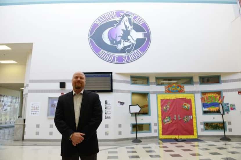 Cain Middle School principal Jason Johnston won the H-E-B Excellence in Education award in...