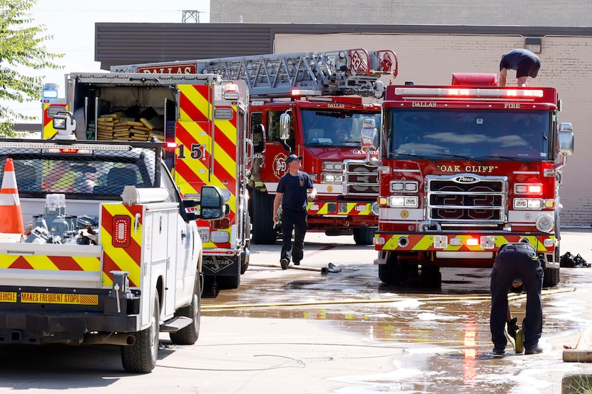 Firefighters work at the scene of a fire at Nolan Estes Plaza.Thursday, Sept. 26, 2024, in...