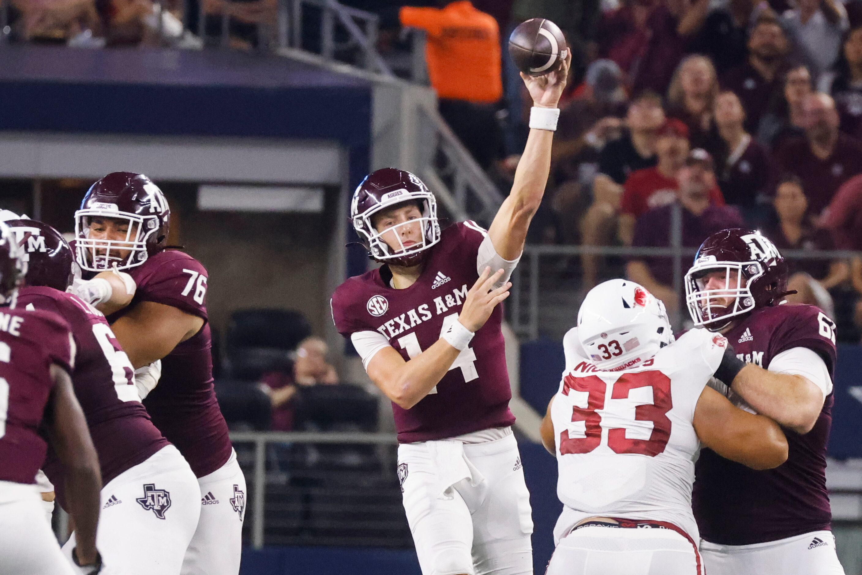 Texas A&M quarterback Max Johnson (14) throws the ball against Arkansas during the first...