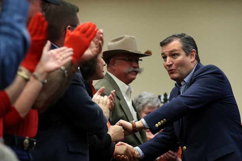 U.S. Sen. Ted Cruz (R-TX) greets supporters during a Get Out The Vote Bus Tour rally on...