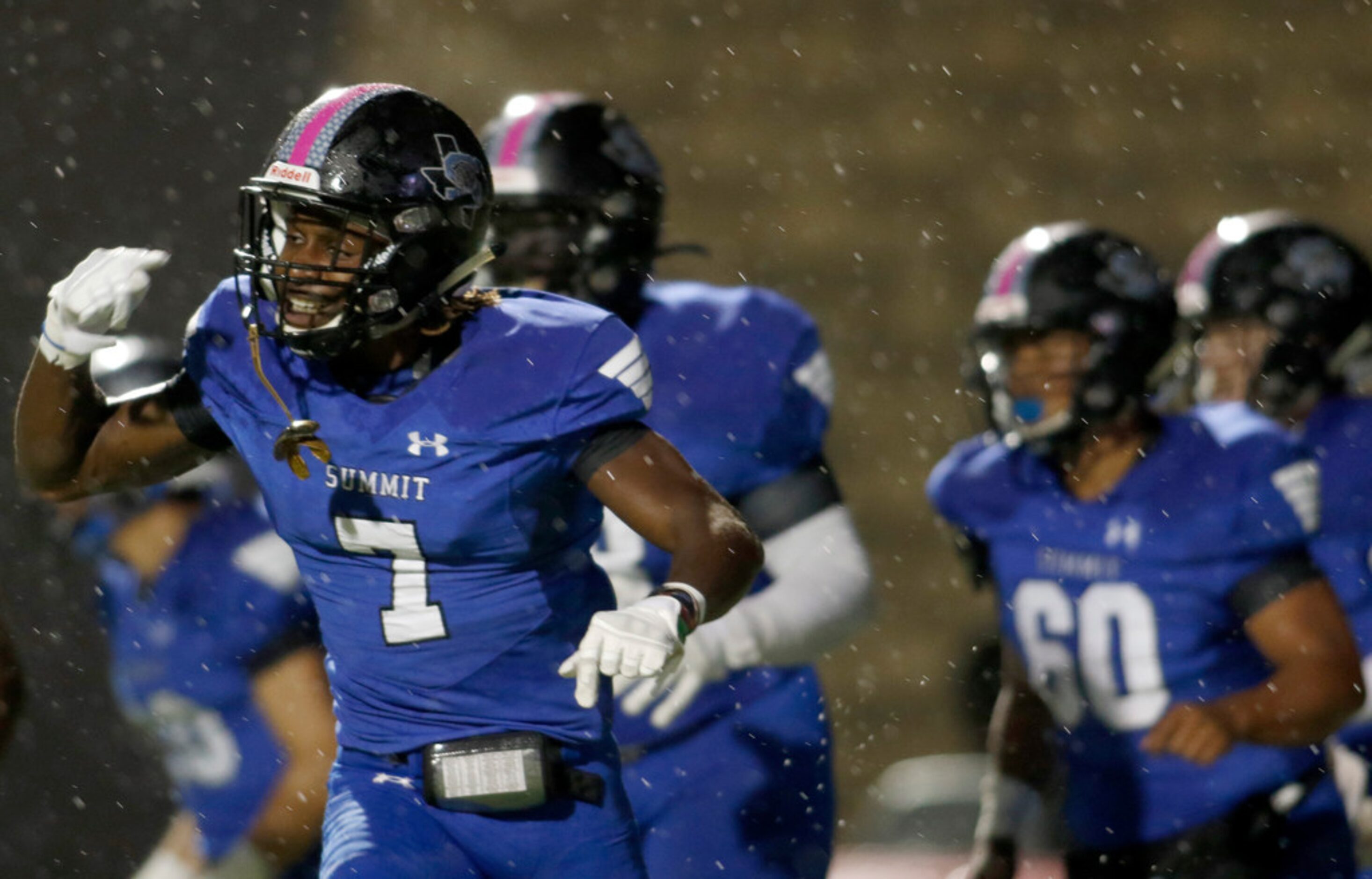 Mansfield Summit receiver Brendan Sirls (7) was all smiles after turning a reception into a...