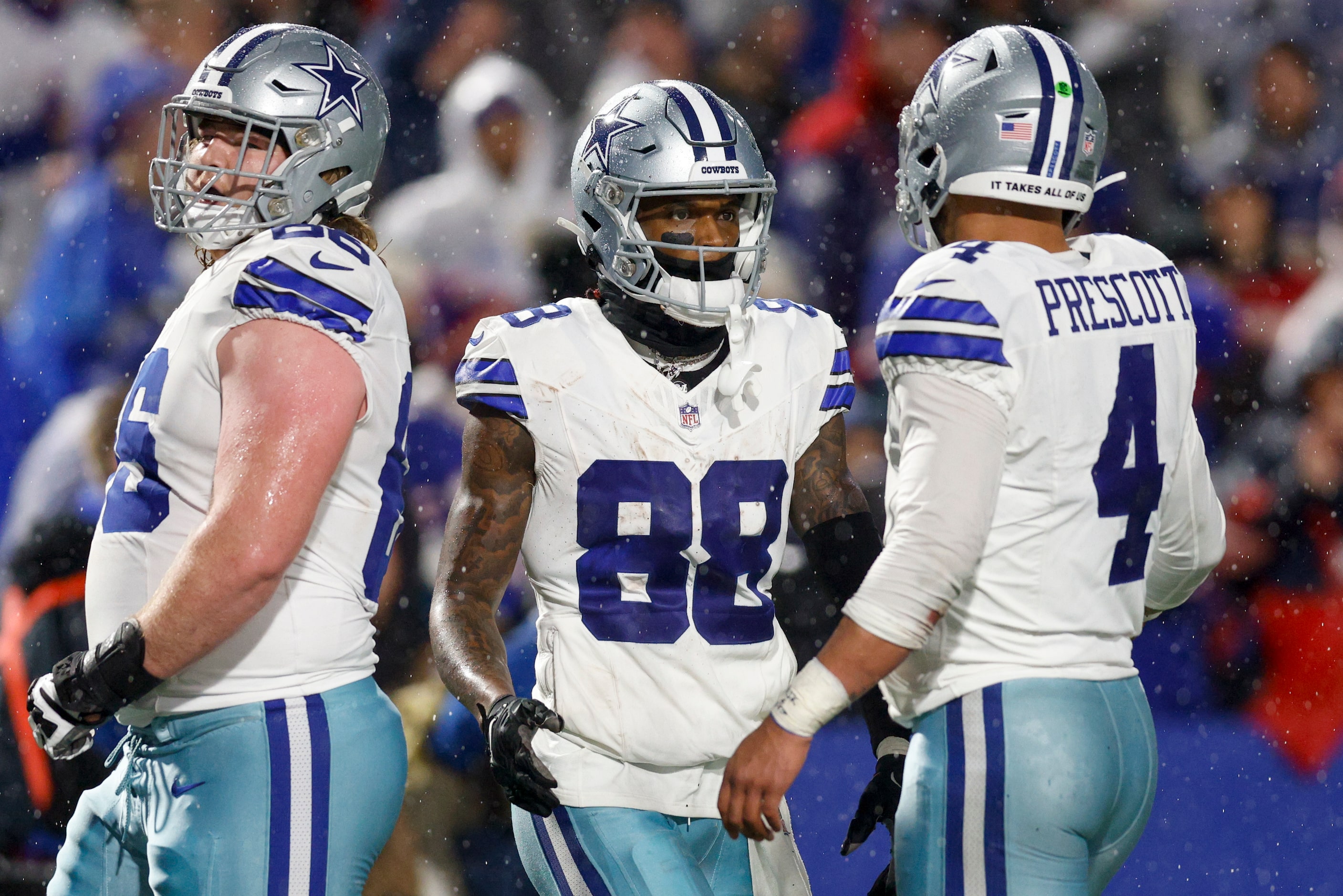 Dallas Cowboys quarterback Dak Prescott (4) celebrates a touchdown with wide receiver CeeDee...