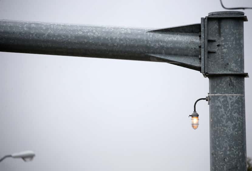 Richardson uses small white lights like this one (upper right) attached to a traffic stop...