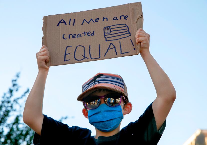A boy invoked the phrase "All men are created equal" while protesting the murder of George...