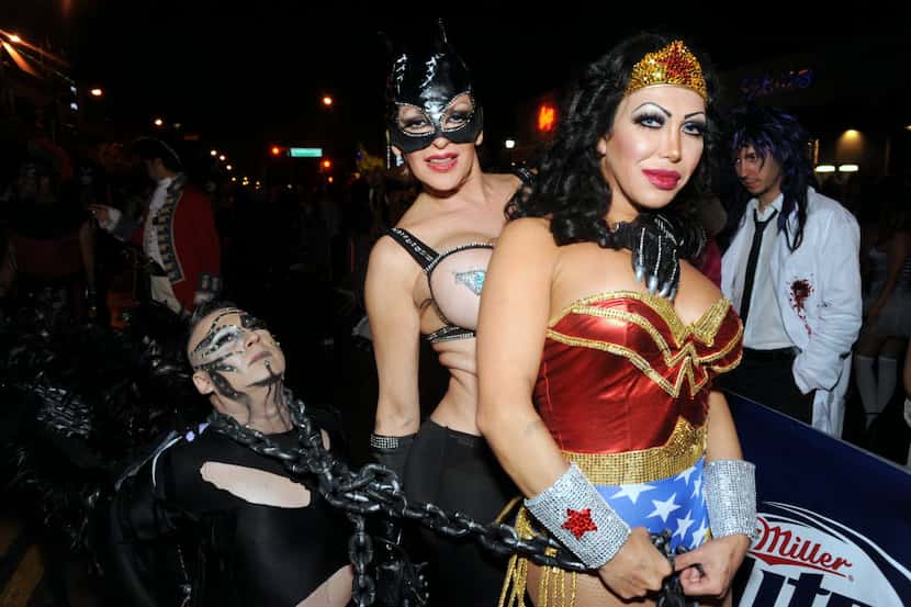 Eduardo Arryo gets subdued by Catwoman Barbara Lustro and Wonder Woman Pearl Diaz at the...