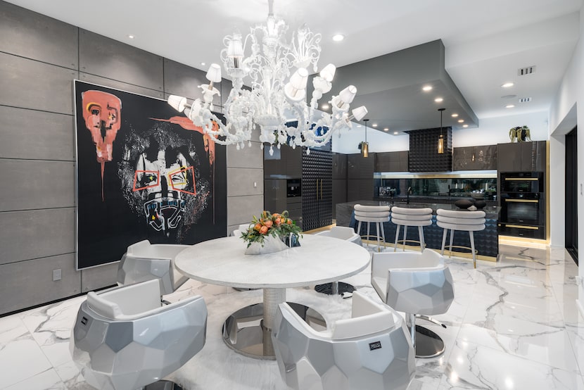 The contemporary kitchen was inspired by the spaceship in the 'Tron: Legacy' movie. Fendi...