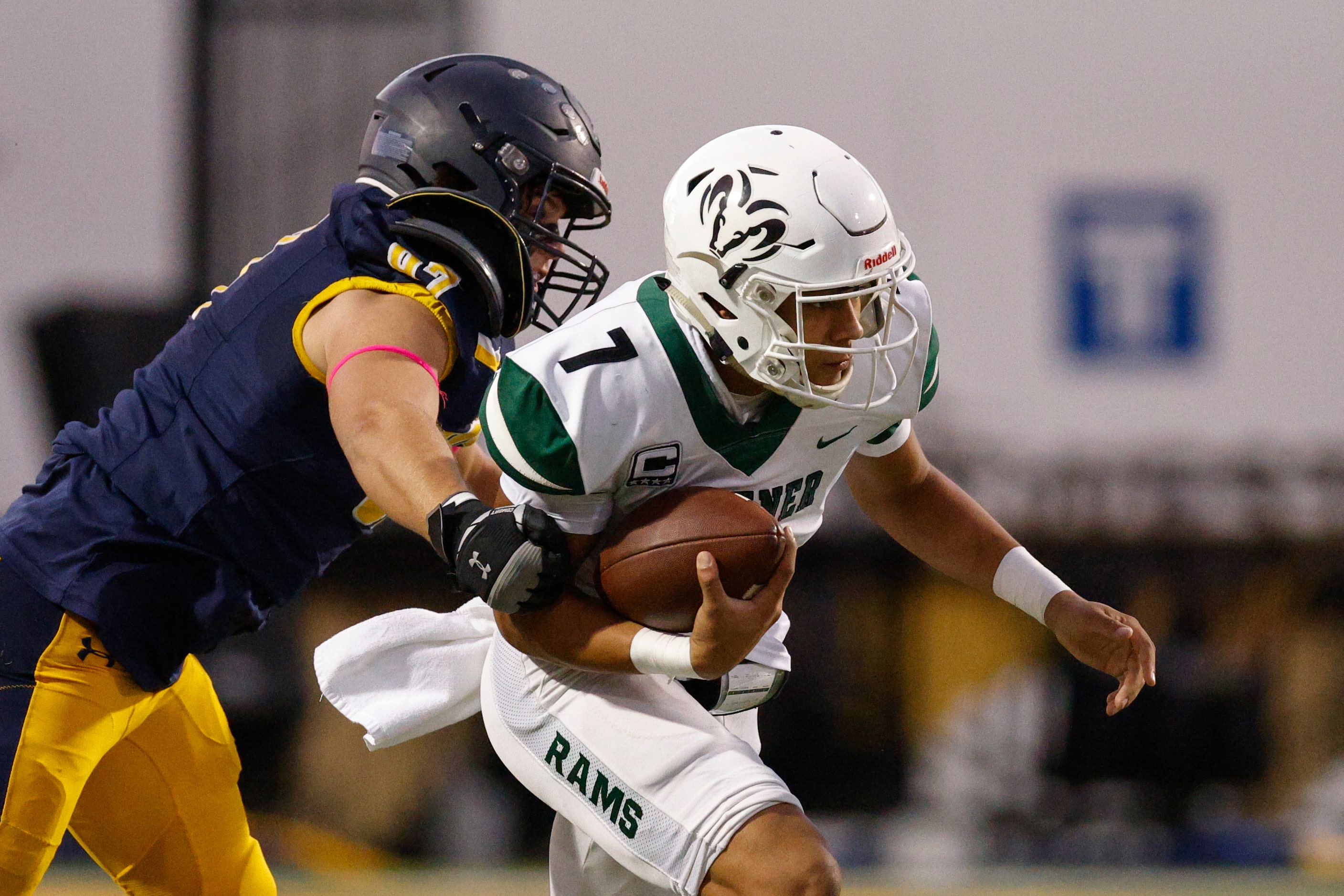 Highland Park offensive lineman Henry Richter (97) tackles Richardson Berkner quarterback...