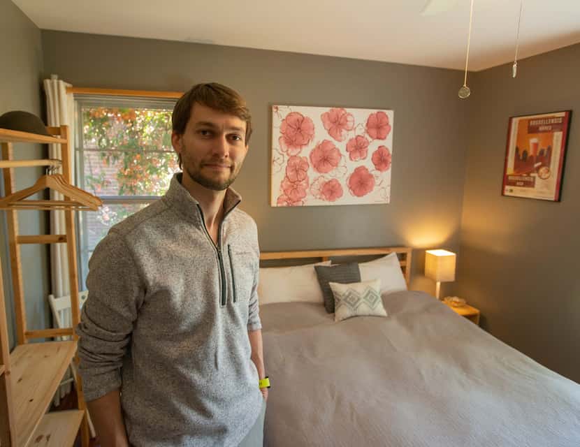 Corey Reinaker in the bedroom he and his wife rent out through AirBNB at their home in...
