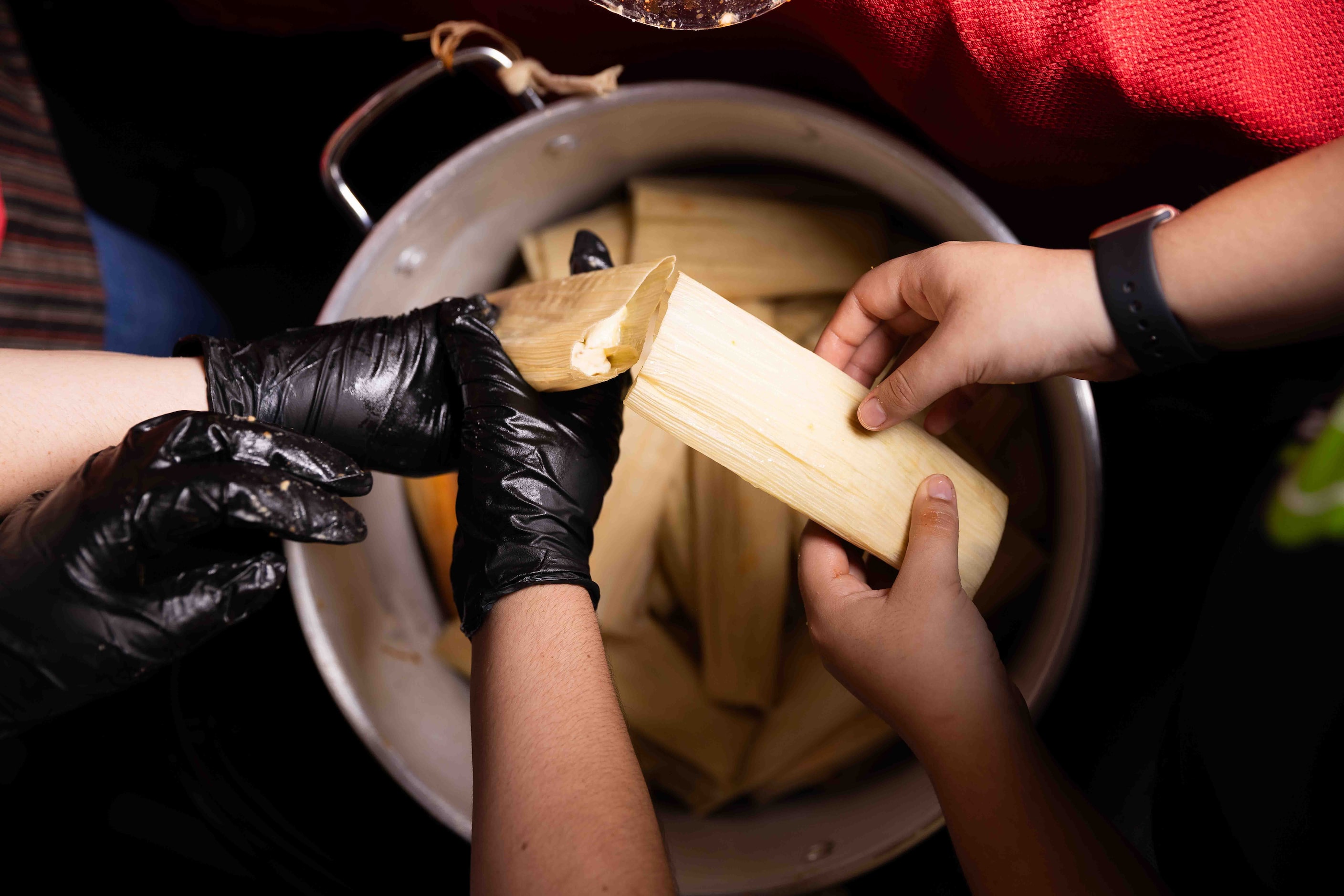 Tamales are arranged for cooking as chosen family help Sara Klein (not pictured), the...