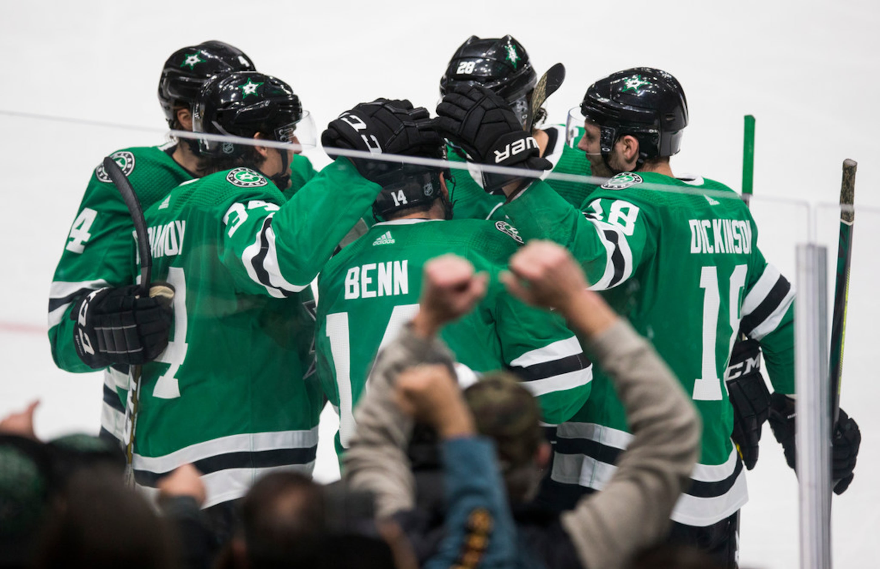 The Dallas Stars celebrate a goal scored by left wing Jamie Benn (14) during the first...