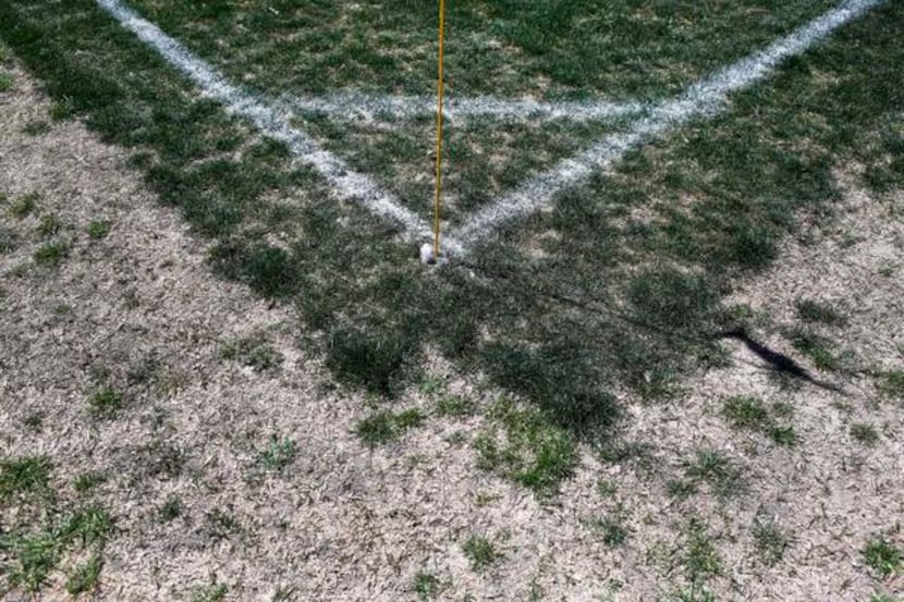 
Worn areas are evident on the fields, such as this patch just out of bounds on the corner...