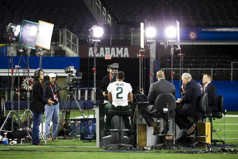 Michigan State cornerback Darian Hicks sat down for a television interview during Cotton...