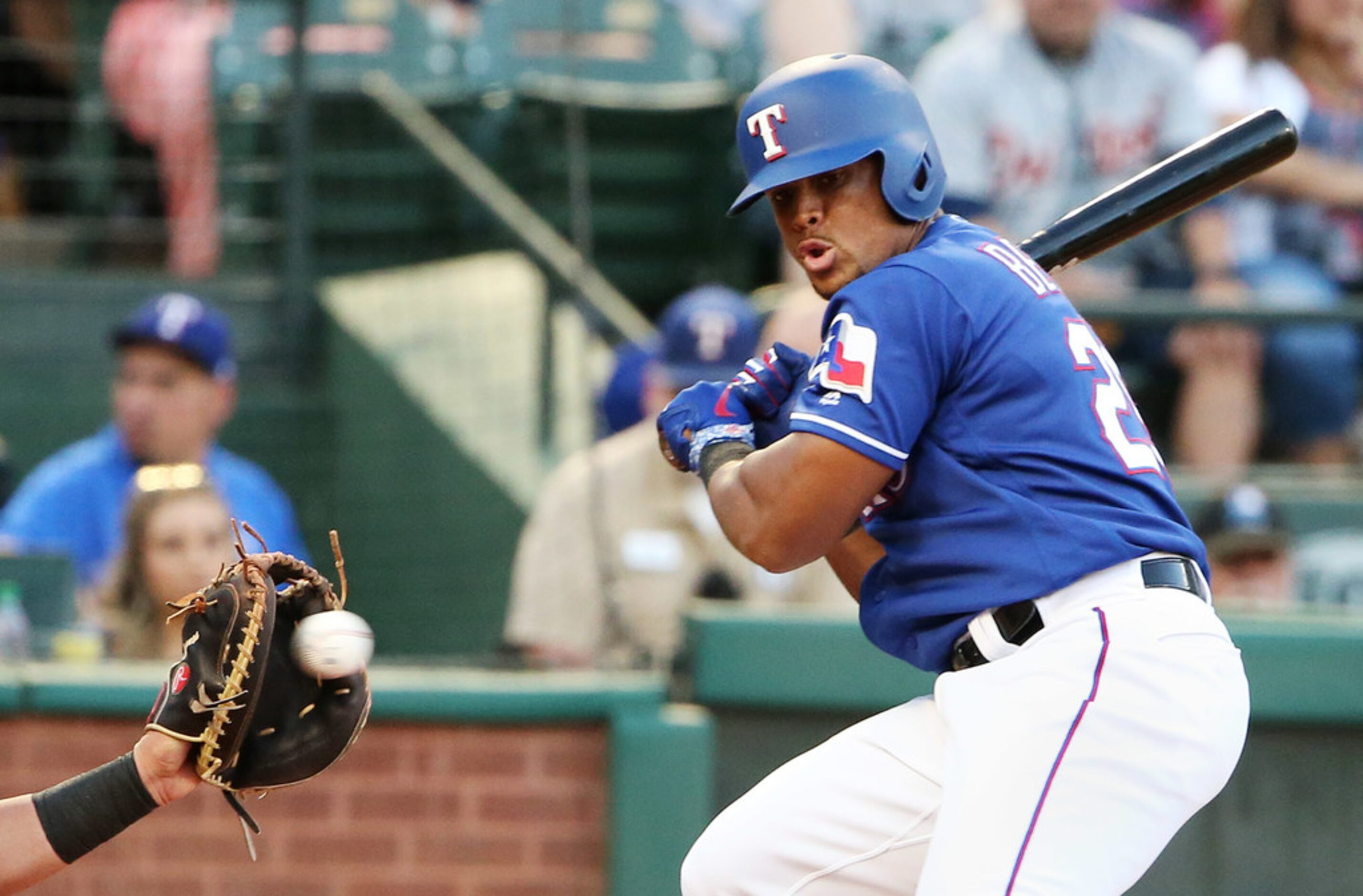 Texas Rangers third baseman Adrian Beltre (29) dunks out of the way of a pitch during the...