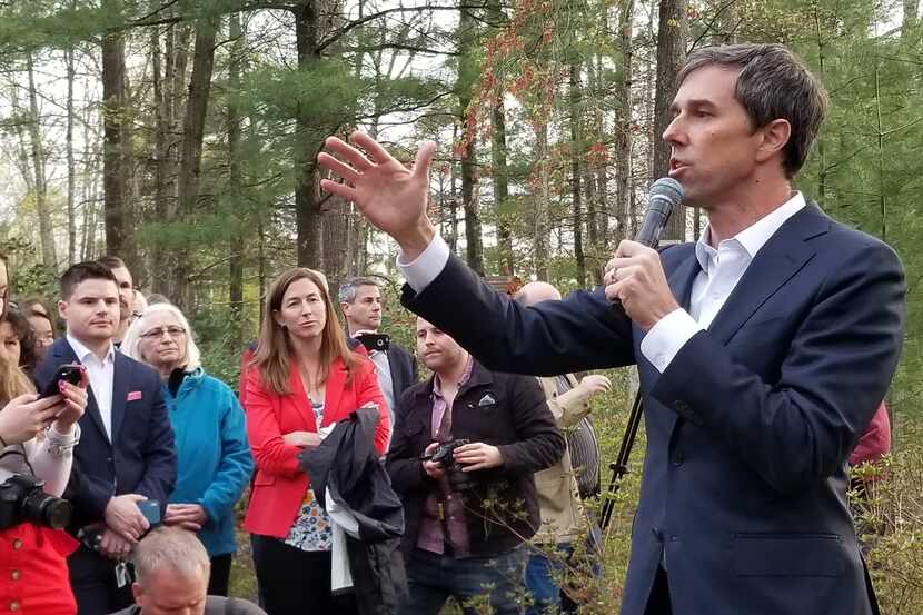 Beto O'Rourke stumped in Salem, N.H., on Thursday as his wife, Amy (in red jacket) looks on.