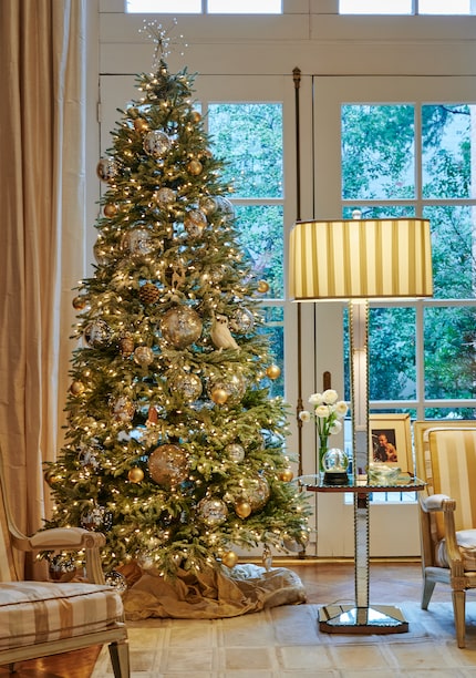 Showers' Christmas tree is adorned with a collection of ornaments ranging from Pottery Barn...