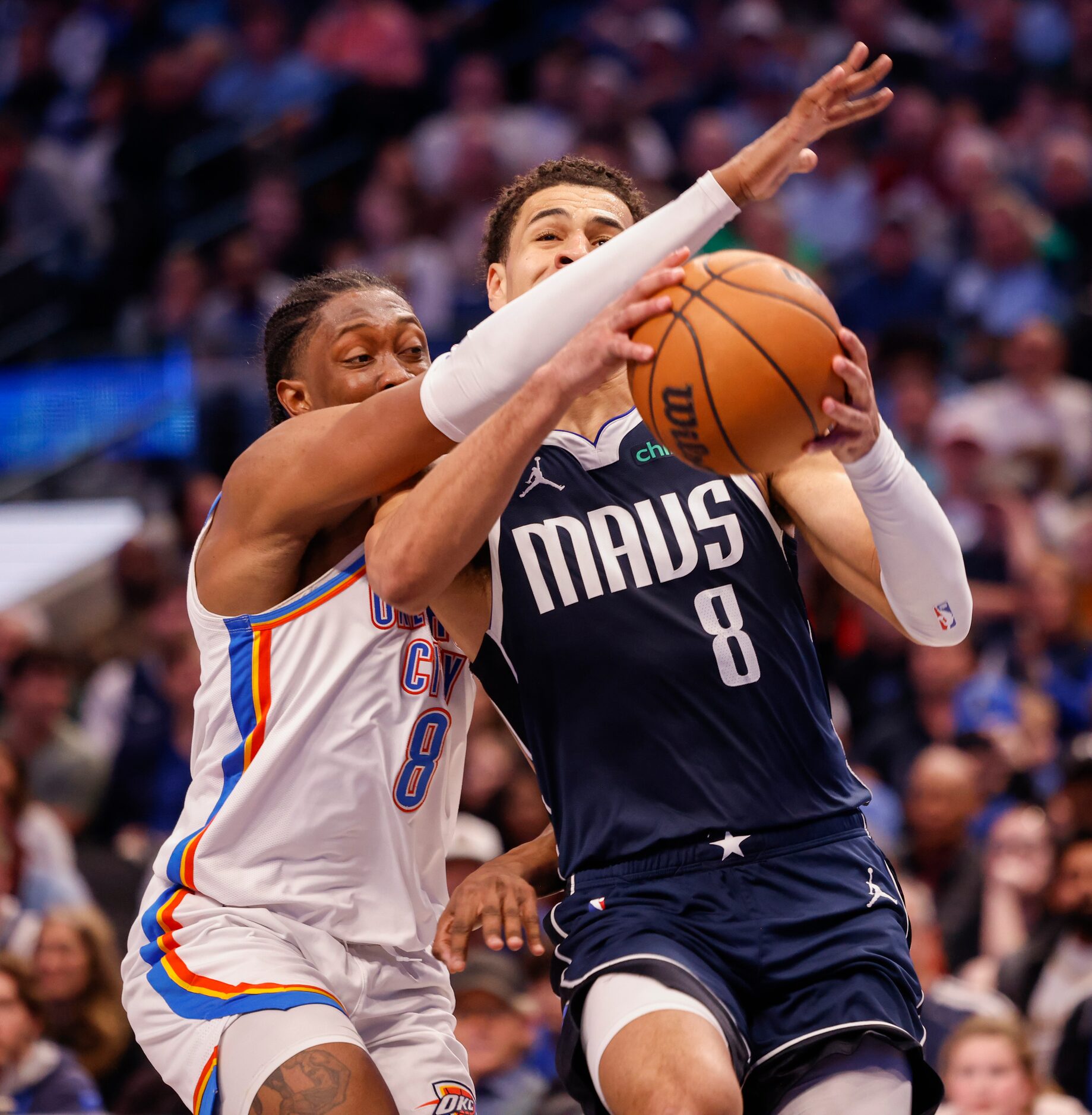 Dallas Mavericks guard Josh Green (8) is fouled by Oklahoma City Thunder forward Jalen...