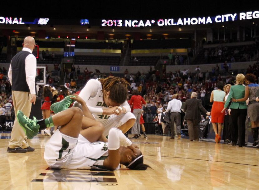 Baylor Bears guard Odyssey Sims (0) and Baylor Bears center Brittney Griner (42) dejected on...